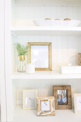  Styling built-in shelves with neutral colors in Cohasset, MA